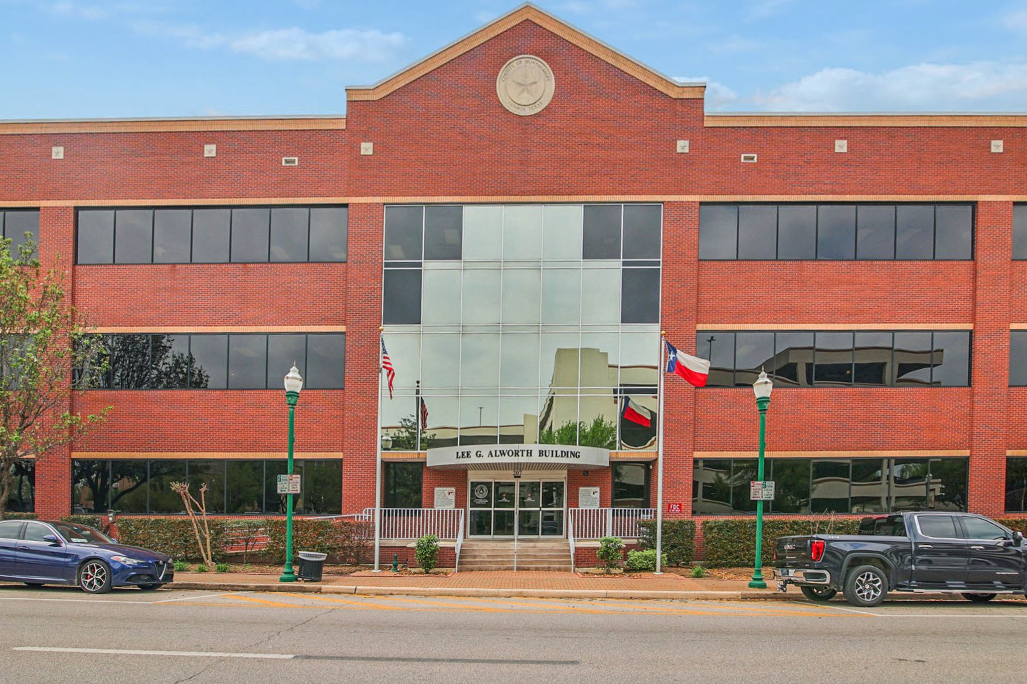 4436 Wapama Falls Loop Conroe, TX 77303 - Photo 38 of 39 a view of a building with a street