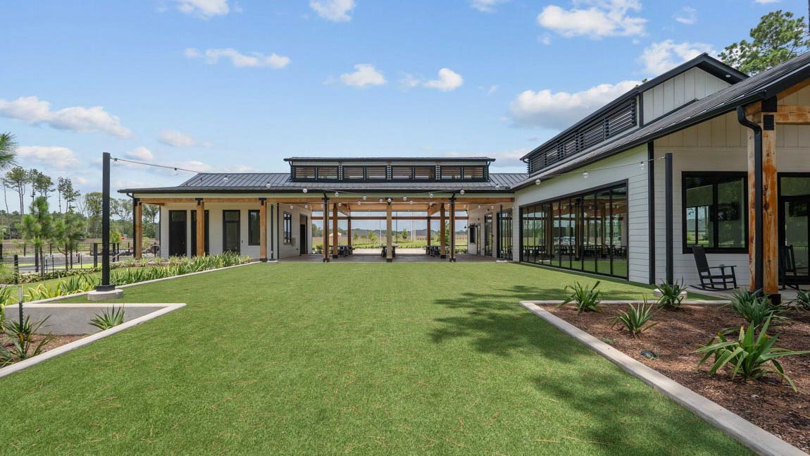 4436 Wapama Falls Loop Conroe, TX 77303 - Photo 10 of 39 a view of an house with backyard porch and sitting area