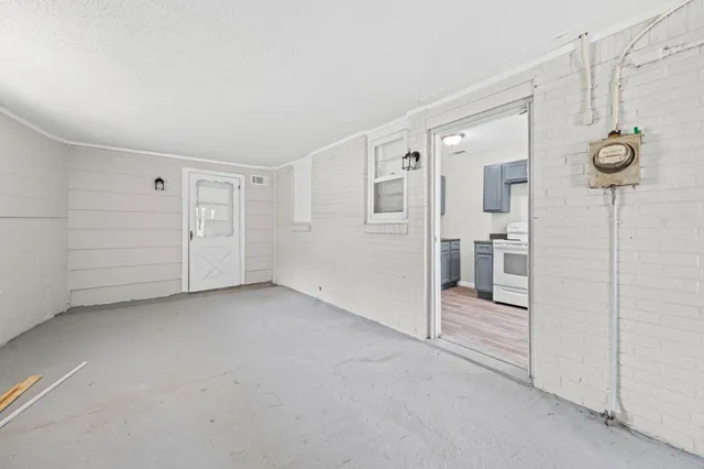 a view of a room with white walls