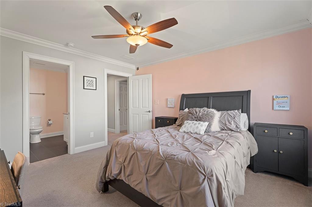 6370 Gumwood Road Oak Ridge, NC 27310 - Photo 27 of 47 Upstairs bedroom with en-suite bathroom