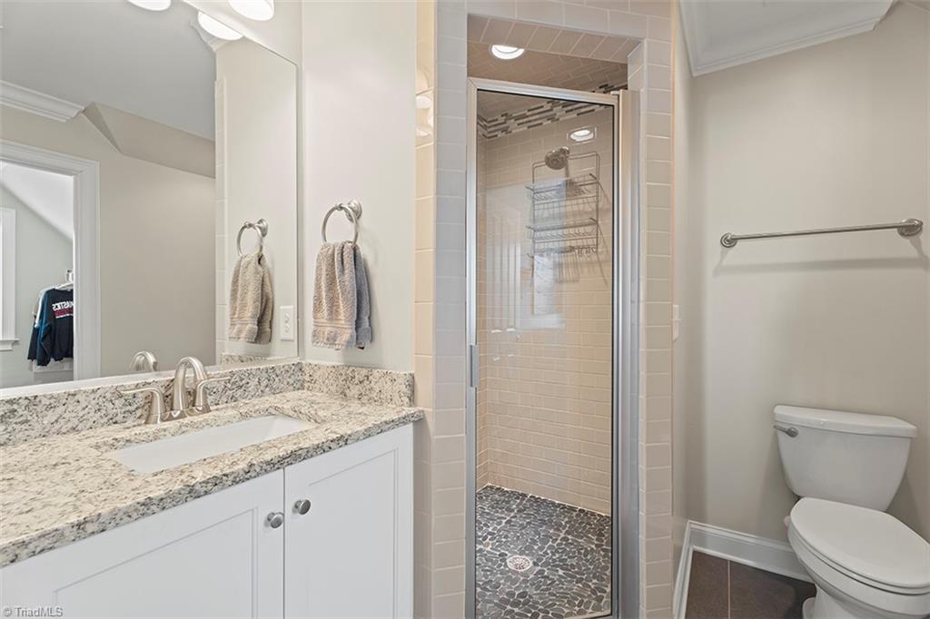 6370 Gumwood Road Oak Ridge, NC 27310 - Photo 32 of 47 Upstairs en-suite bathroom