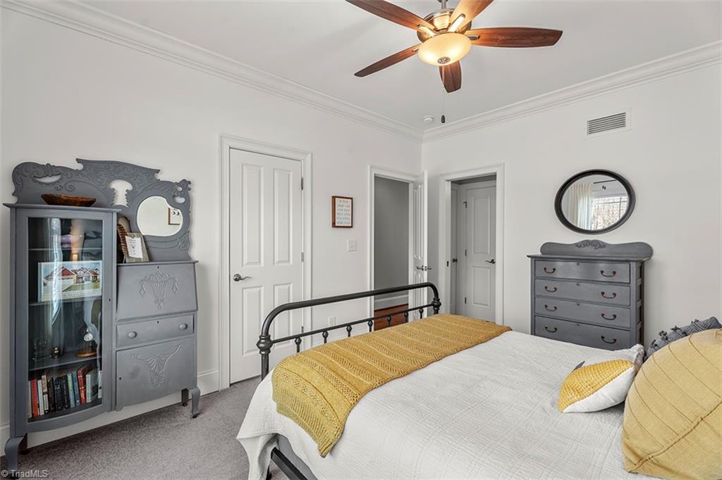 6370 Gumwood Road Oak Ridge, NC 27310 - Photo 33 of 47 Secondary bedroom on the main level with en suite bathroom