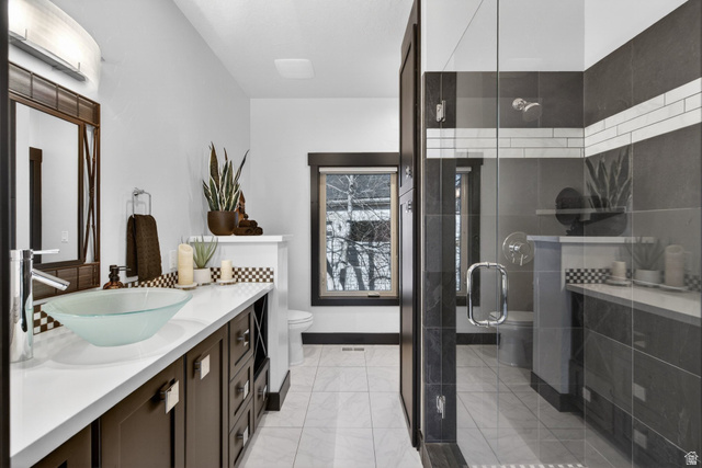 145 Carnesecca Court Mapleton, UT 84664 - Photo 19 of 109 Bathroom featuring vanity and a shower stall