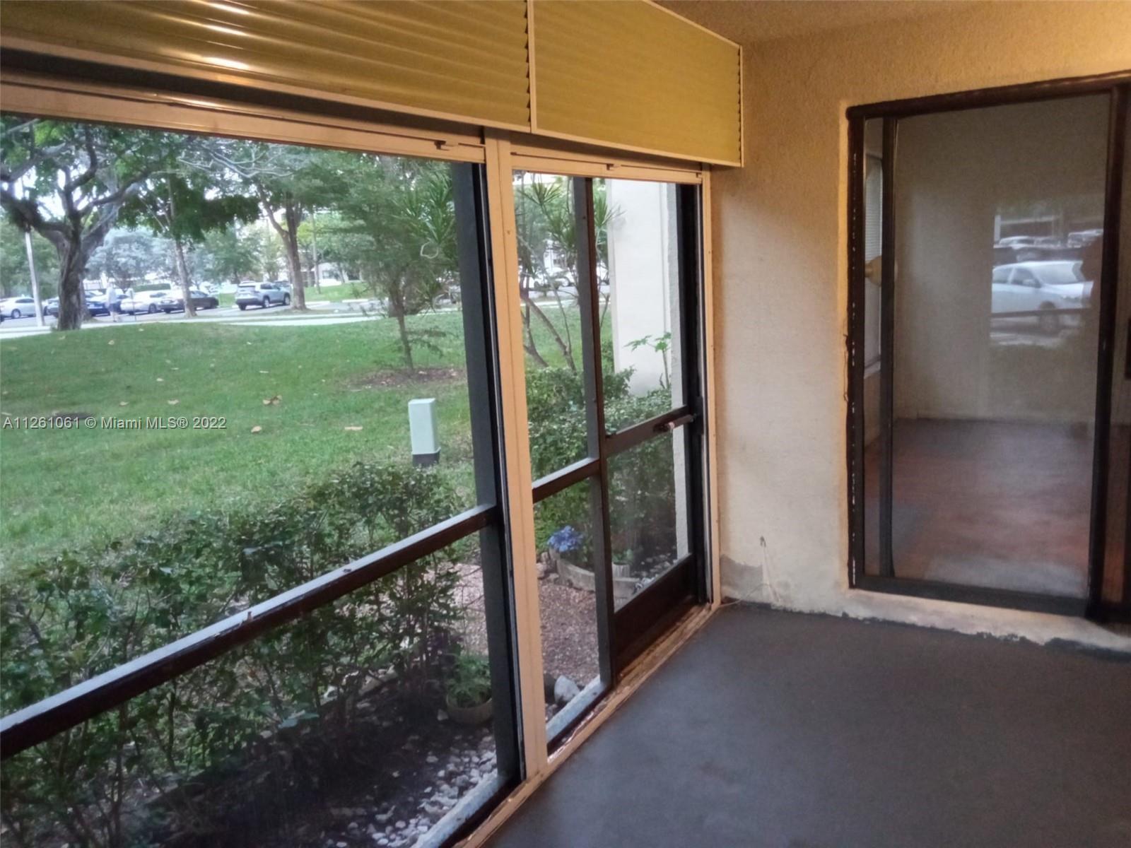 Cypress Bend Pompano Beach, FL 33069 - Photo 30 of 31 a view of a room with a large window