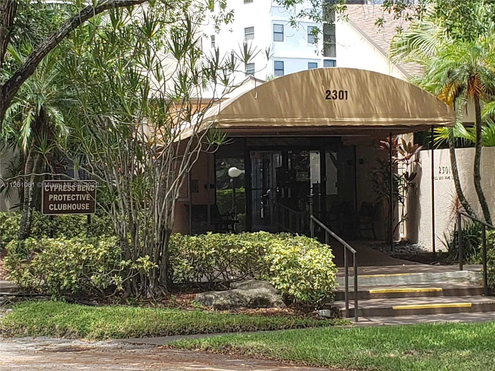 Cypress Bend Pompano Beach, FL 33069 - Photo 4 of 31 a view of a house with a yard