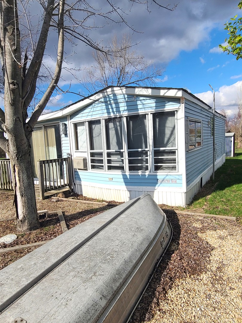 28-142 Woodhaven Sublette, IL 61367 - Photo 1 of 17 a view of a house with a outdoor space
