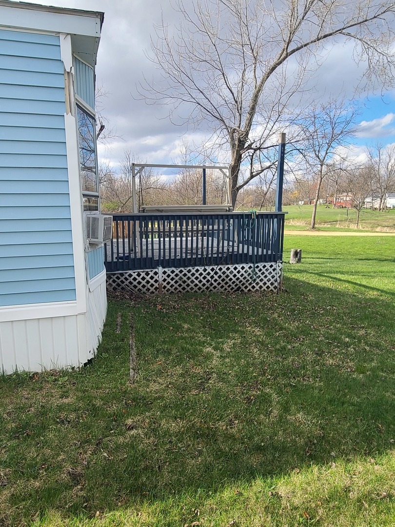 28-142 Woodhaven Sublette, IL 61367 - Photo 3 of 17 a view of a yard with a porch