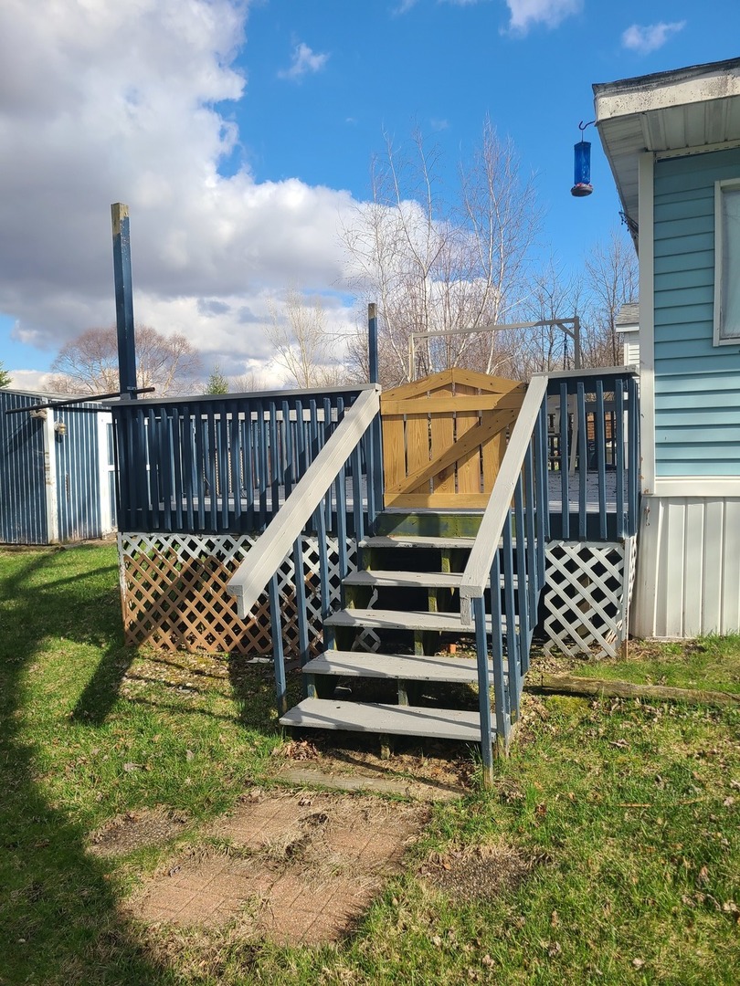 28-142 Woodhaven Sublette, IL 61367 - Photo 4 of 17 a view of stairs and yard
