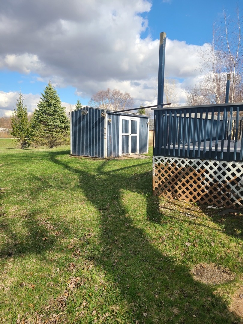 28-142 Woodhaven Sublette, IL 61367 - Photo 5 of 17 a view of a house with a yard