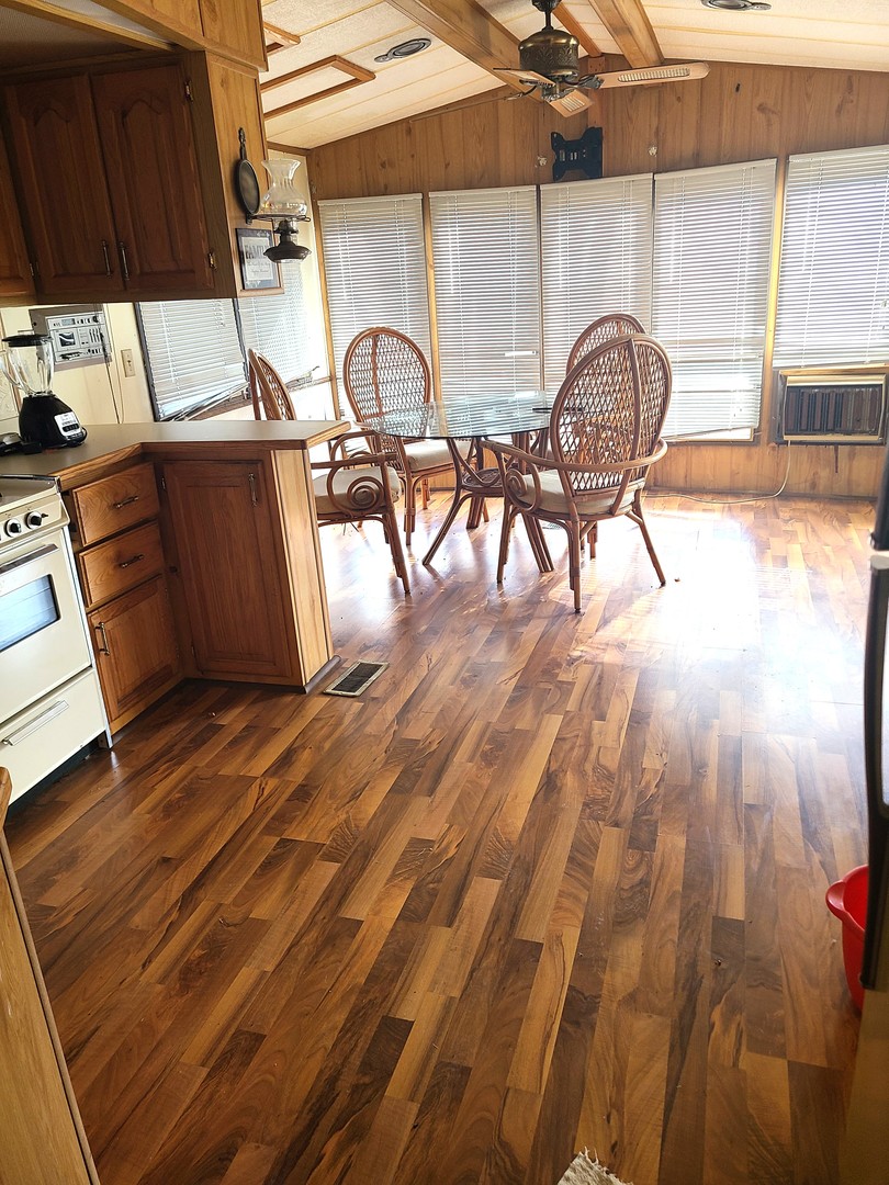 28-142 Woodhaven Sublette, IL 61367 - Photo 9 of 17 a workspace with wooden floor
