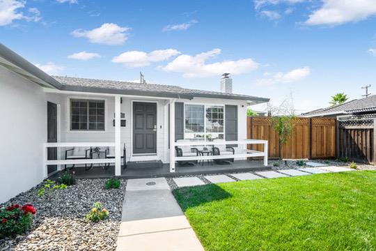 1364 Bouret Drive San Jose, CA 95118 - Photo 1 of 35 a front view of a house with garden