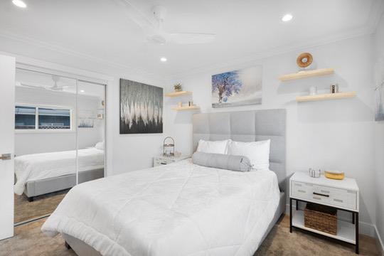 1364 Bouret Drive San Jose, CA 95118 - Photo 15 of 35 a bedroom with a bed and a couch