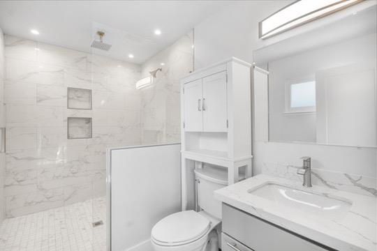 1364 Bouret Drive San Jose, CA 95118 - Photo 19 of 35 a bathroom with a sink toilet vanity and shower
