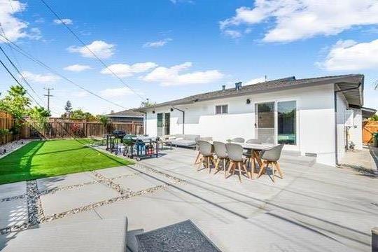 1364 Bouret Drive San Jose, CA 95118 - Photo 27 of 35 a view of a patio with table and chairs with plants and garden