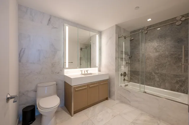 a view of a kitchen with wooden floor