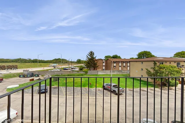 a view of a city from a balcony