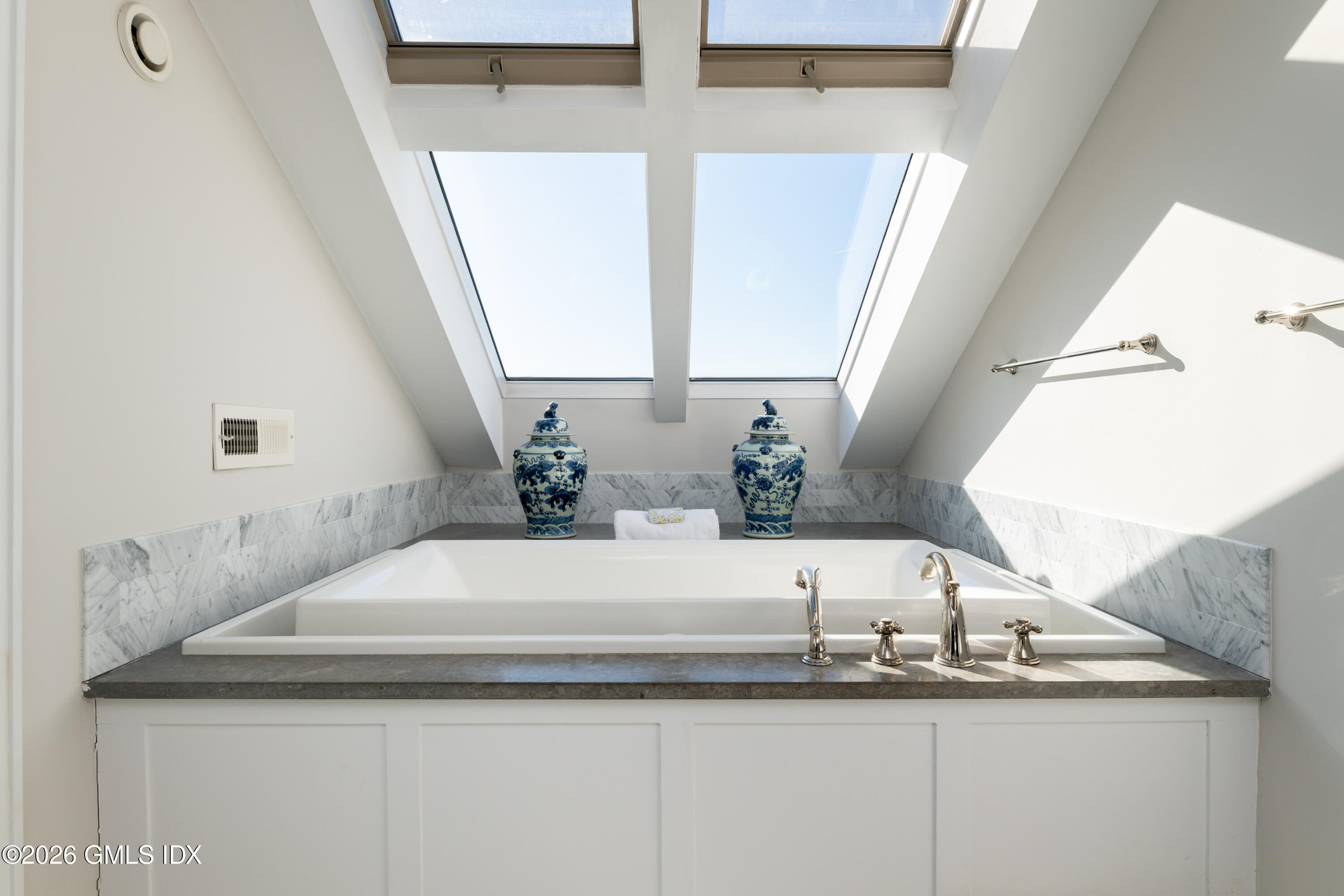 189 Shore Road Old Greenwich, CT 06870 - Photo 21 of 38 a view of a sink and a mirror