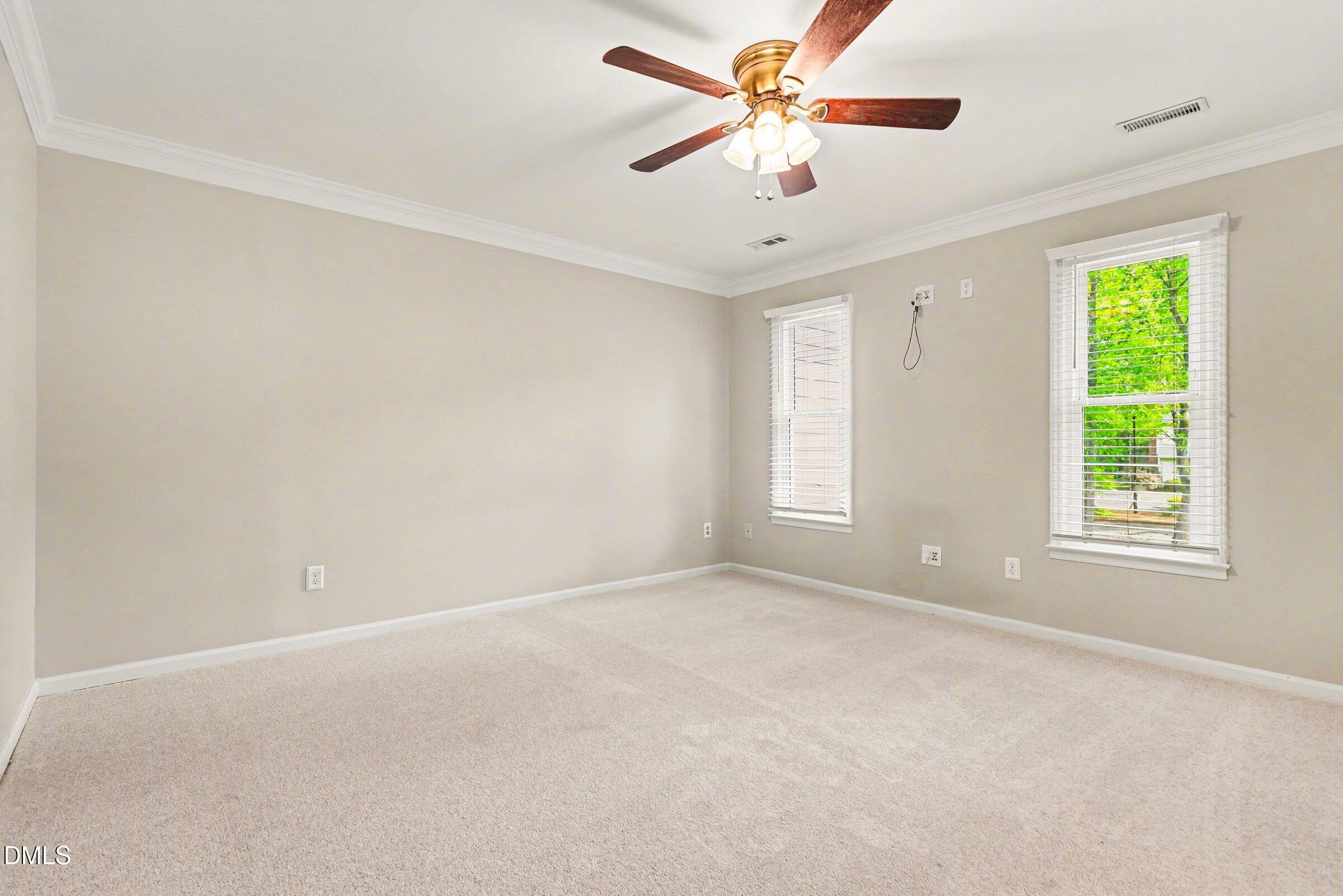 5645 Hamstead Crossing Raleigh, NC 27612 - Photo 16 of 35 a view of an empty room with a window