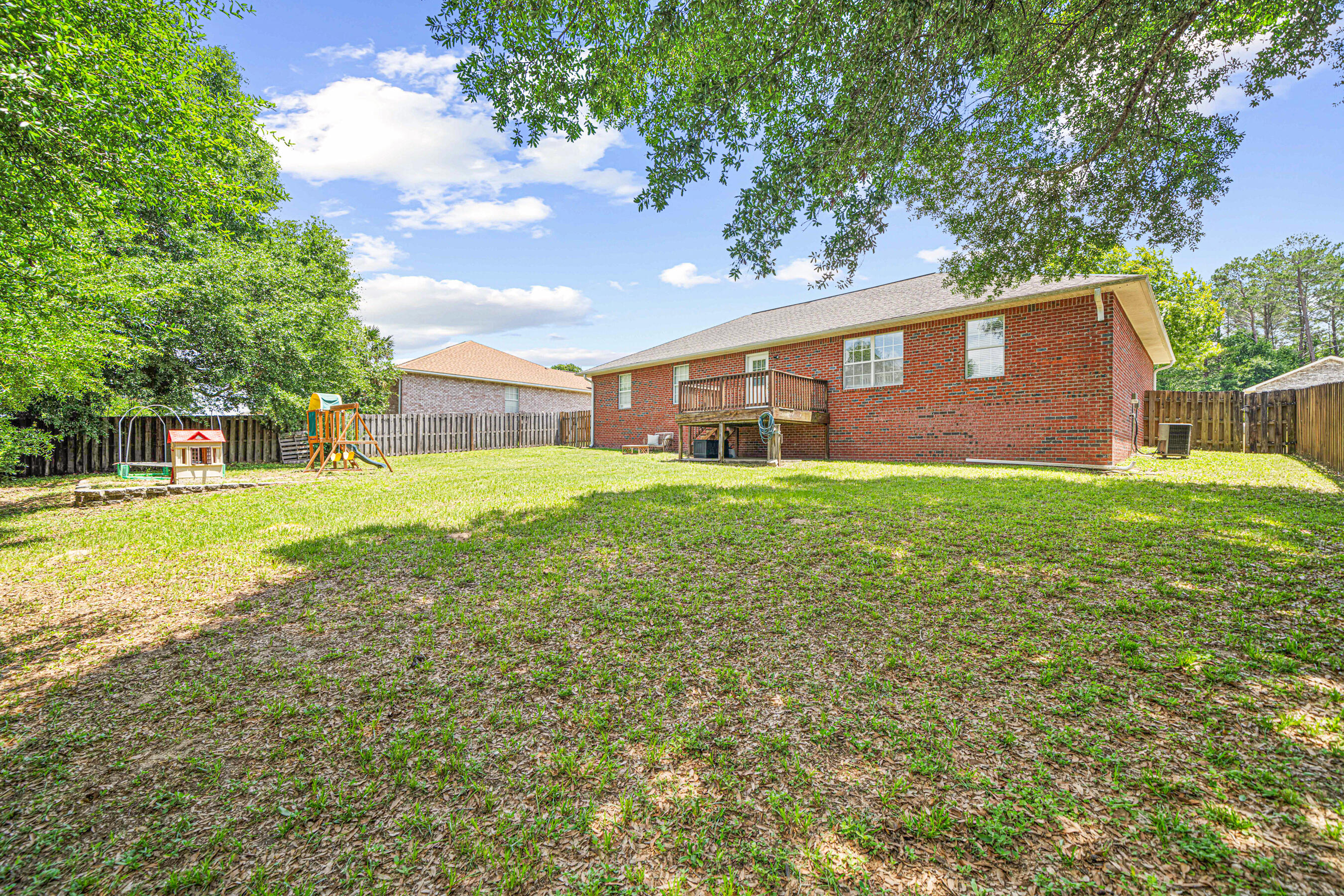 138 Conquest Avenue Crestview, FL 32536 - Photo 14 of 34 a view of a house with a yard