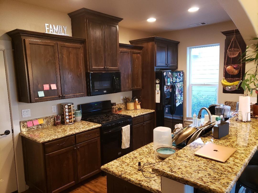 517 Buck Point Street Central Point, OR 97502 - Photo 3 of 12 a kitchen with granite countertop lots of counter top space