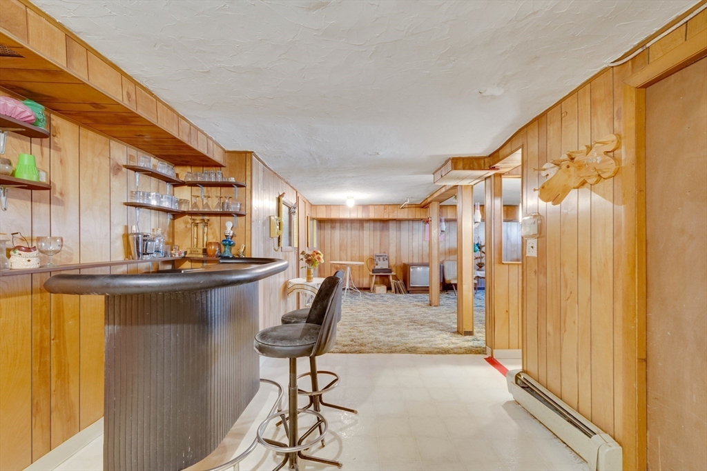 83 Bartlett Avenue Arlington, MA 02476 - Photo 17 of 22 a view of a living room and bathroom