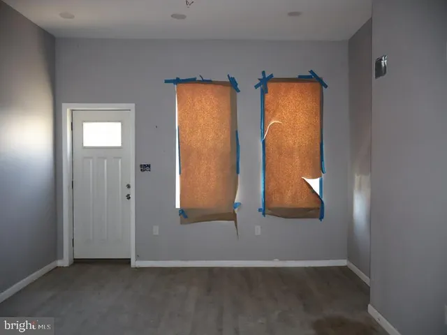 an empty room that has a window