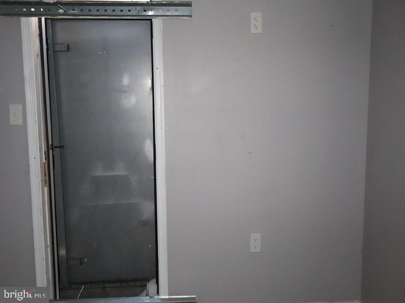 1753 North 27th Street Philadelphia, PA 19121 - Photo 6 of 38 a bathroom with a glass door