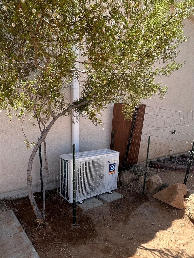 21038 South Cheyenne Road Yucca, AZ 86438 - Photo 94 of 98 Exterior details featuring ac unit