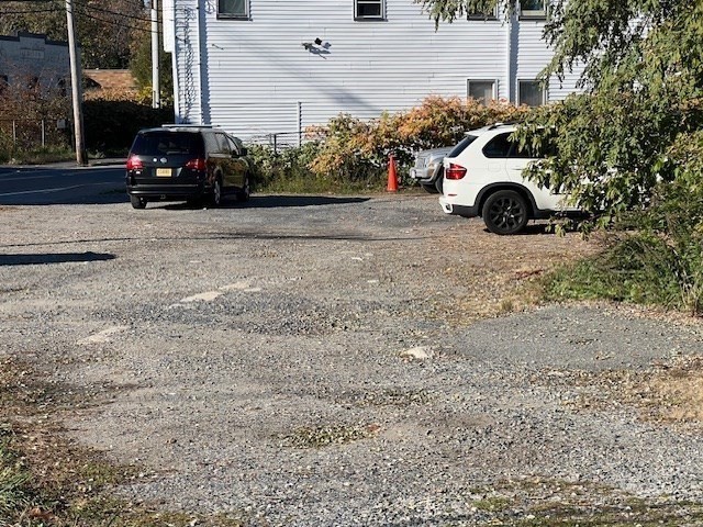 112 Ames Street Brockton, MA 02302 - Photo 5 of 9 a view of street with parked cars