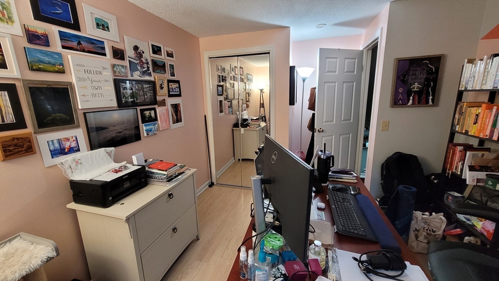 113 Harvard Street, Unit 1 Everett, MA 02149 - Photo 21 of 24 a room with storage and utility