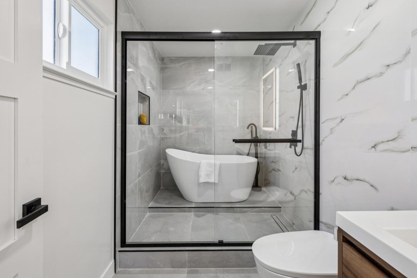 2043 Shellback Place San Jose, CA 95133 - Photo 27 of 52 a bathroom with a toilet and a shower