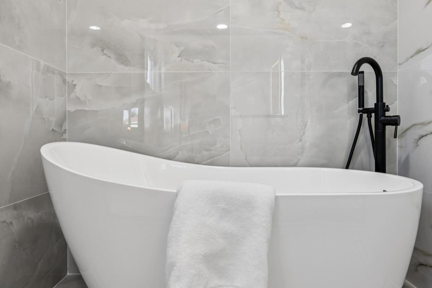 2043 Shellback Place San Jose, CA 95133 - Photo 28 of 52 a bathroom with a bathtub