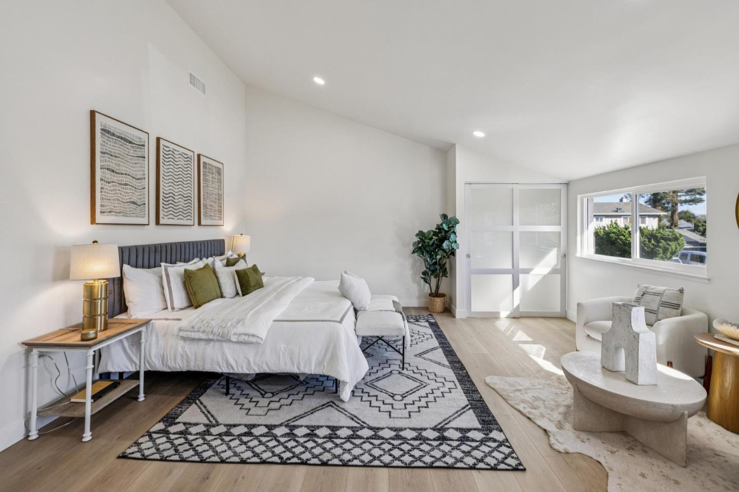2043 Shellback Place San Jose, CA 95133 - Photo 30 of 52 a living room with a couch and a table