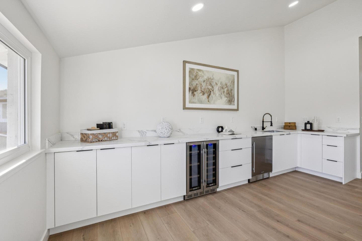 2043 Shellback Place San Jose, CA 95133 - Photo 34 of 52 a view of cabinets and wooden floor