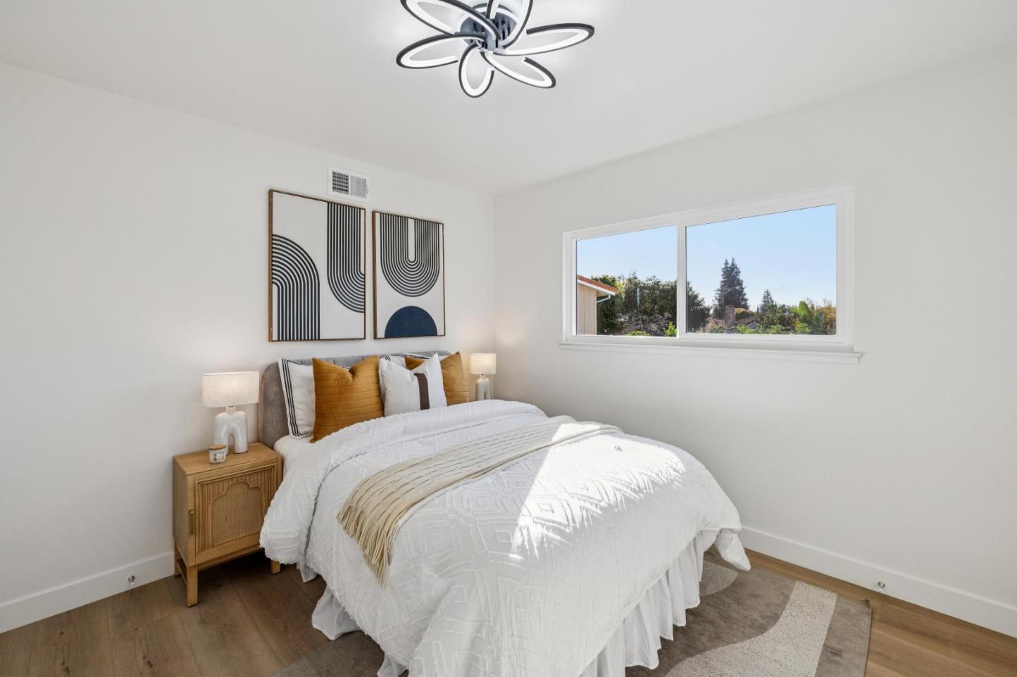 2043 Shellback Place San Jose, CA 95133 - Photo 42 of 52 a bedroom with a bed and a window
