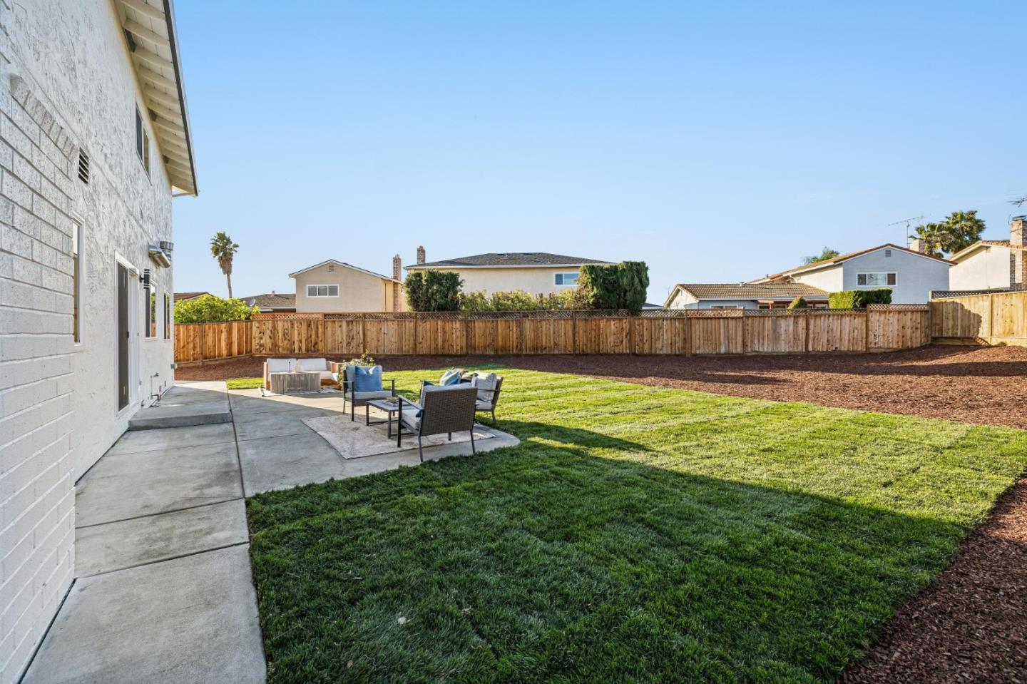 2043 Shellback Place San Jose, CA 95133 - Photo 45 of 52 a view of a swimming pool with a patio and a yard