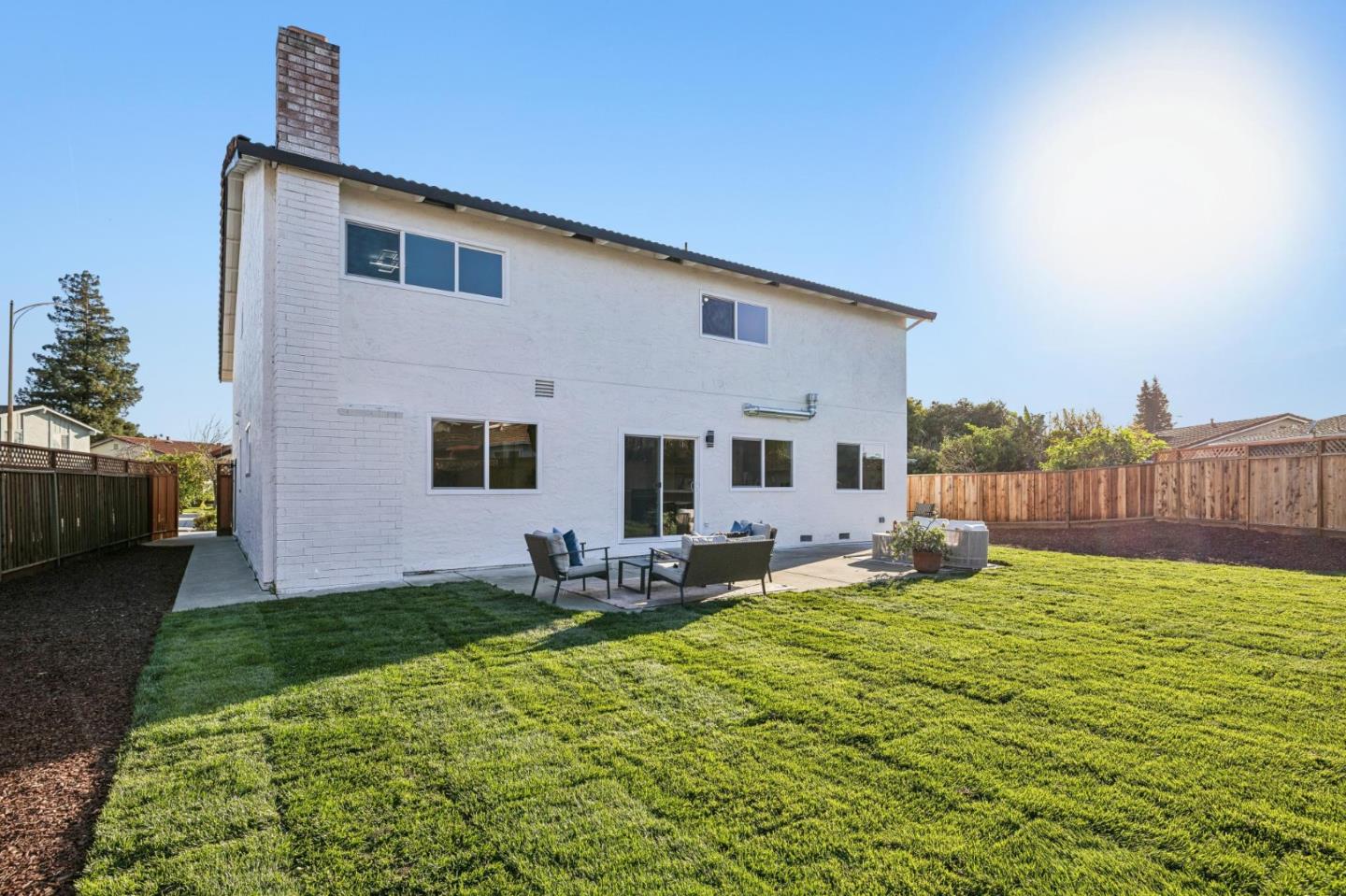 2043 Shellback Place San Jose, CA 95133 - Photo 52 of 52 a backyard of a house with table and chairs