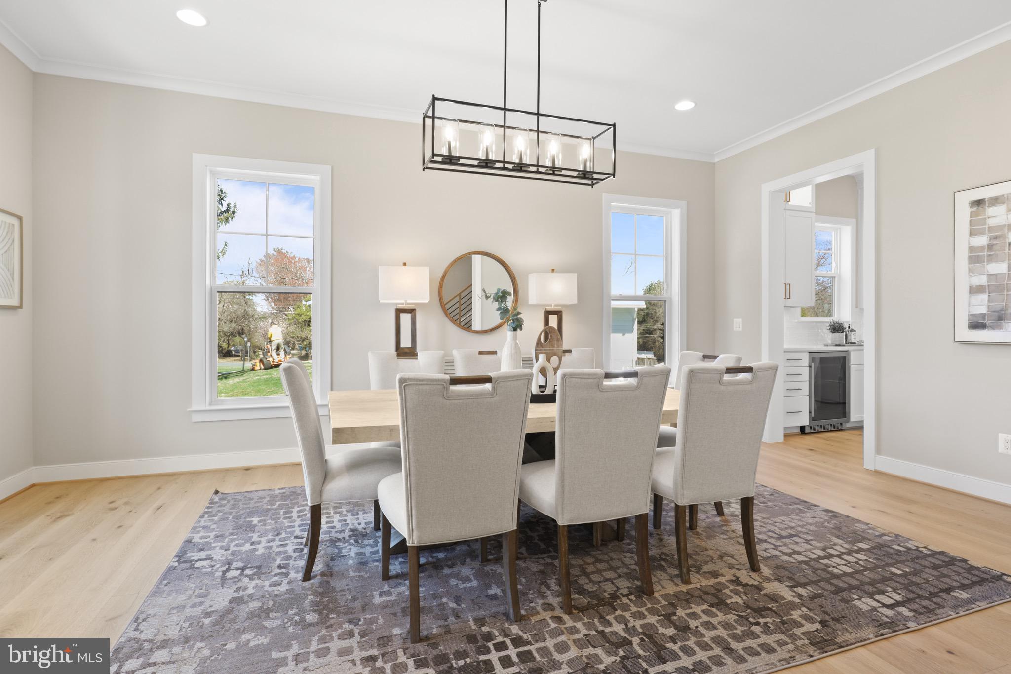 1749 Beulah Road Vienna, VA 22182 - Photo 13 of 88 a view of a dining room with furniture window and wooden floor