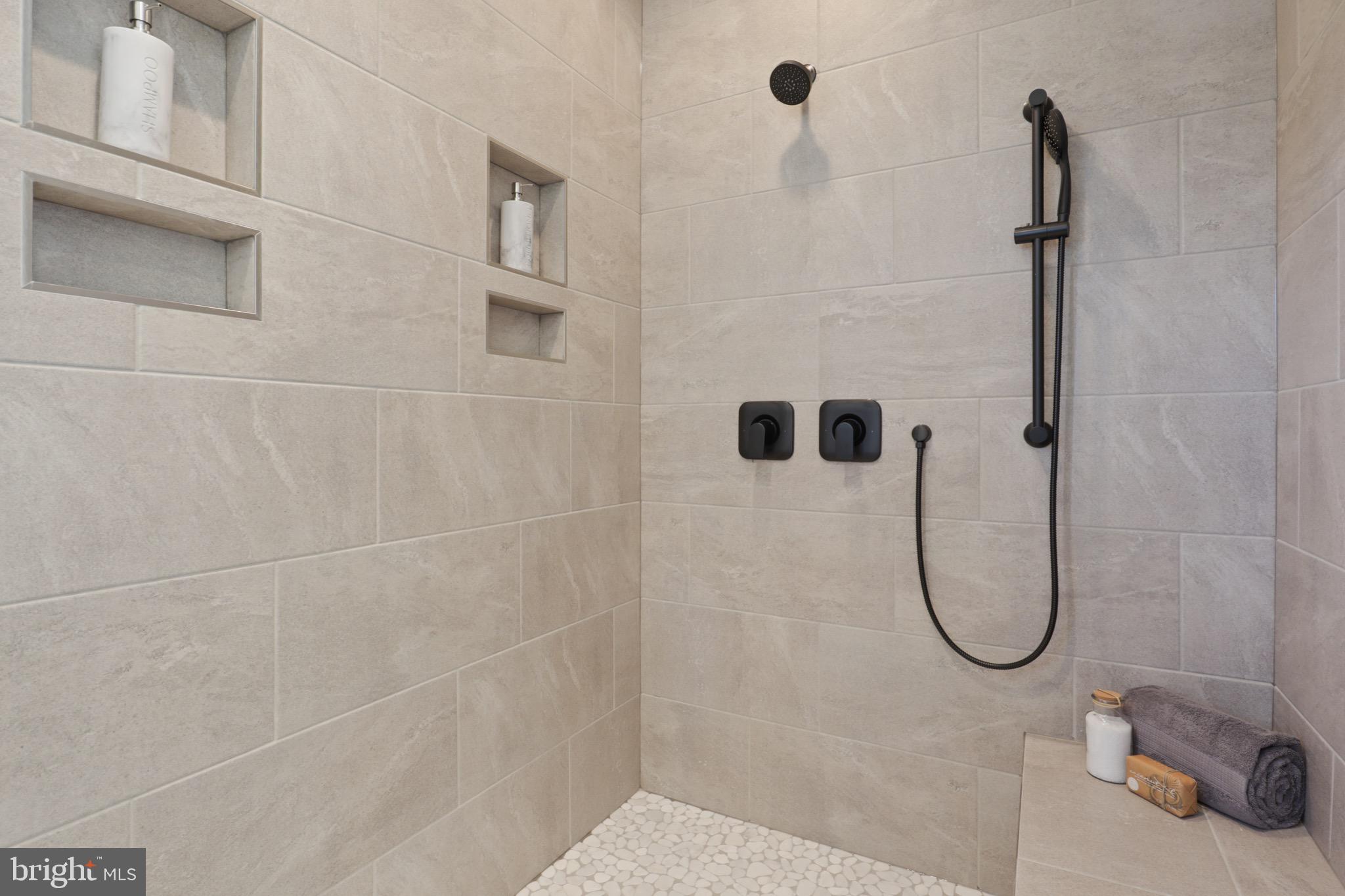 1749 Beulah Road Vienna, VA 22182 - Photo 68 of 88 a bathroom with a bath tub