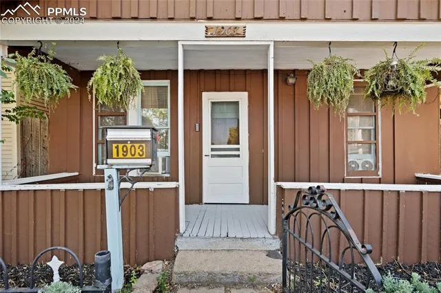 a front view of a house with balcony