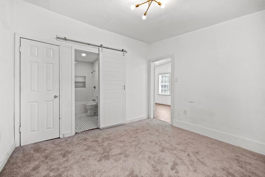 4803 Reiger Avenue Dallas, TX 75246 - Photo 28 of 32 Bedroom in guest quarters.