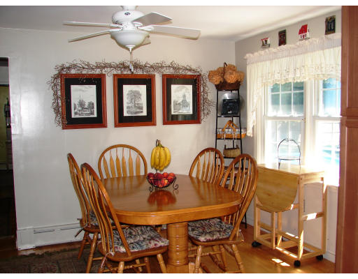 80 South Meadow Road Lancaster, MA 01523 - Photo 6 of 17 a view of a dining room with furniture