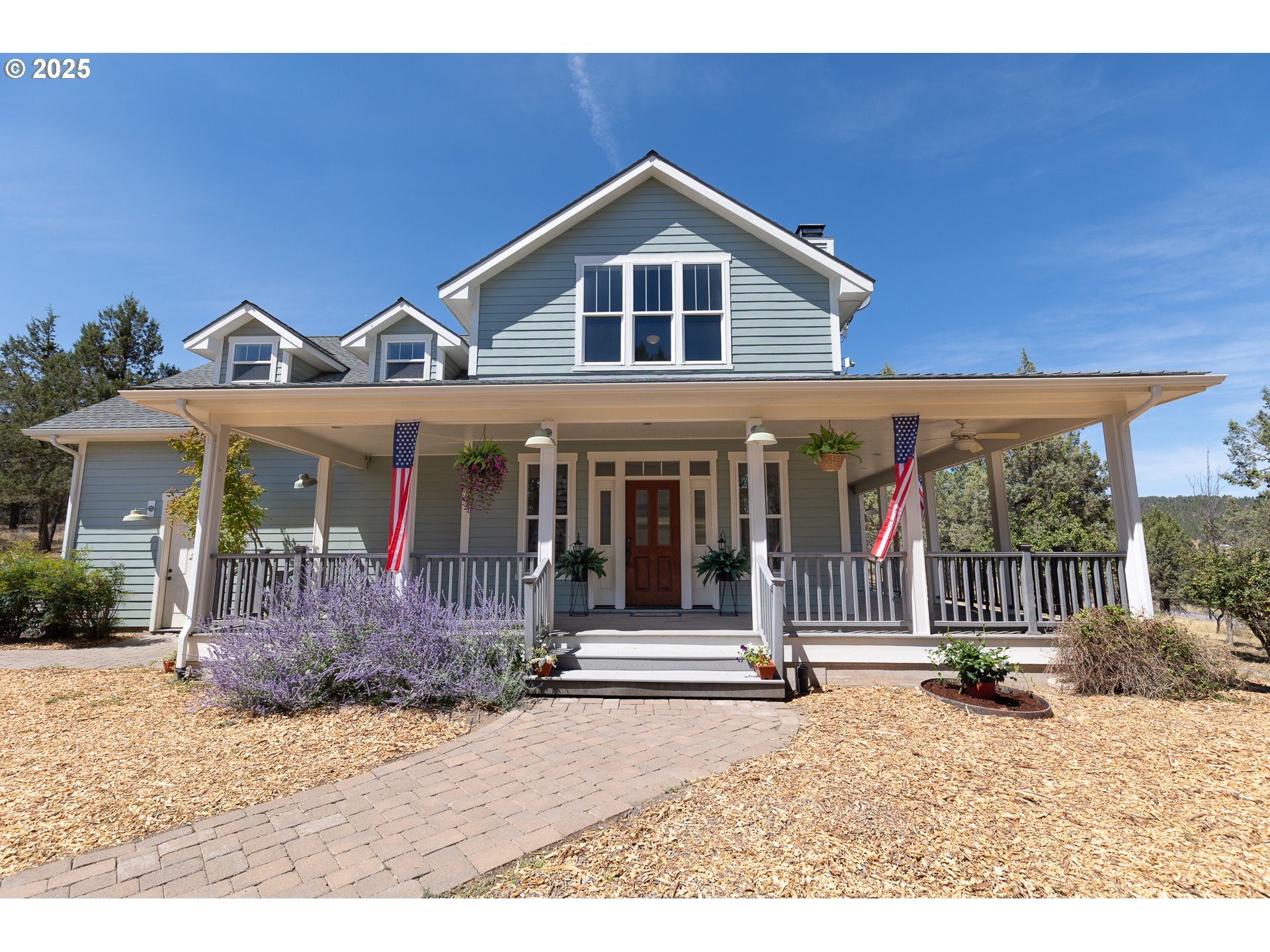 7140 Jake Road Klamath Falls, OR 97601 - Photo 1 of 47 a front view of a house with a garden