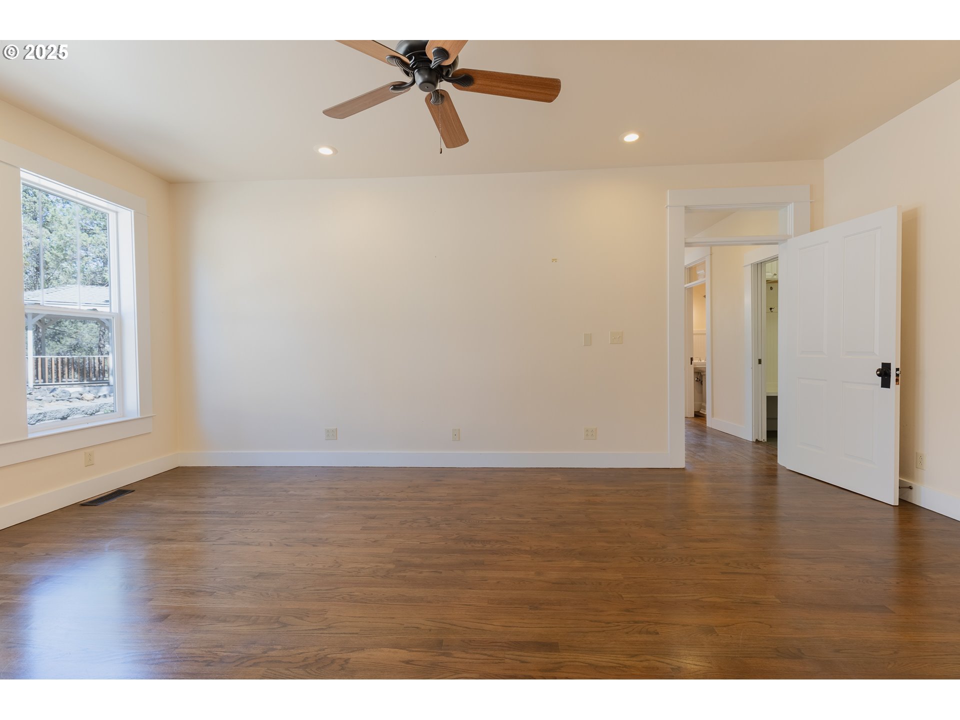 7140 Jake Road Klamath Falls, OR 97601 - Photo 14 of 47 a view of a room with wooden floor and windows