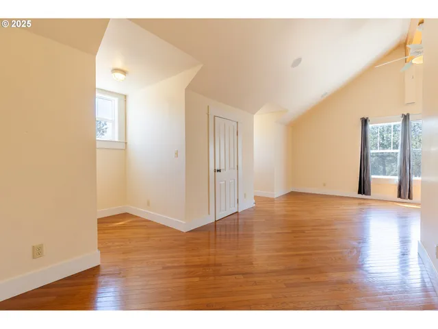 a view of an empty room and window