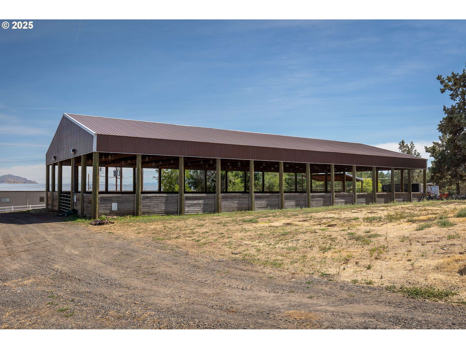 7140 Jake Road Klamath Falls, OR 97601 - Photo 35 of 47 a view of house with yard outdoor seating area and barbeque oven