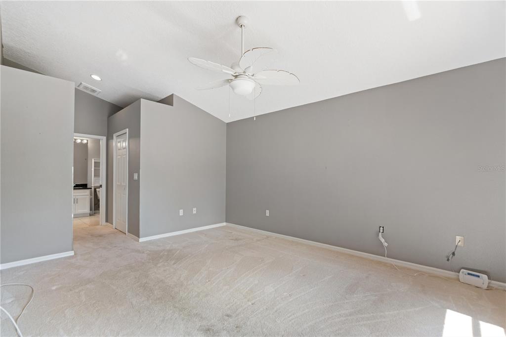 9224 Halberg Drive Hudson, FL 34669 - Photo 12 of 31 an empty room with closet and a ceiling fan