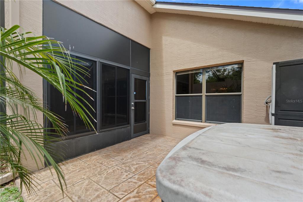 9224 Halberg Drive Hudson, FL 34669 - Photo 26 of 31 a bedroom with a bed and a window