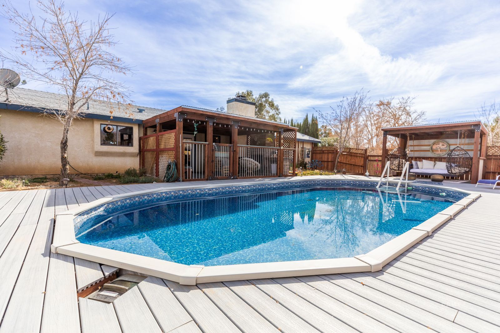 135 Brown Road Inyokern, CA 93527 - Photo 28 of 46 a view of a swimming pool with a lounge chairs