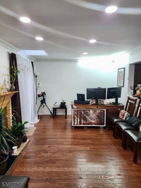 48 Edgefield Drive Morris Plains, NJ 07950 - Photo 13 of 21 a living room with furniture and a flat screen tv